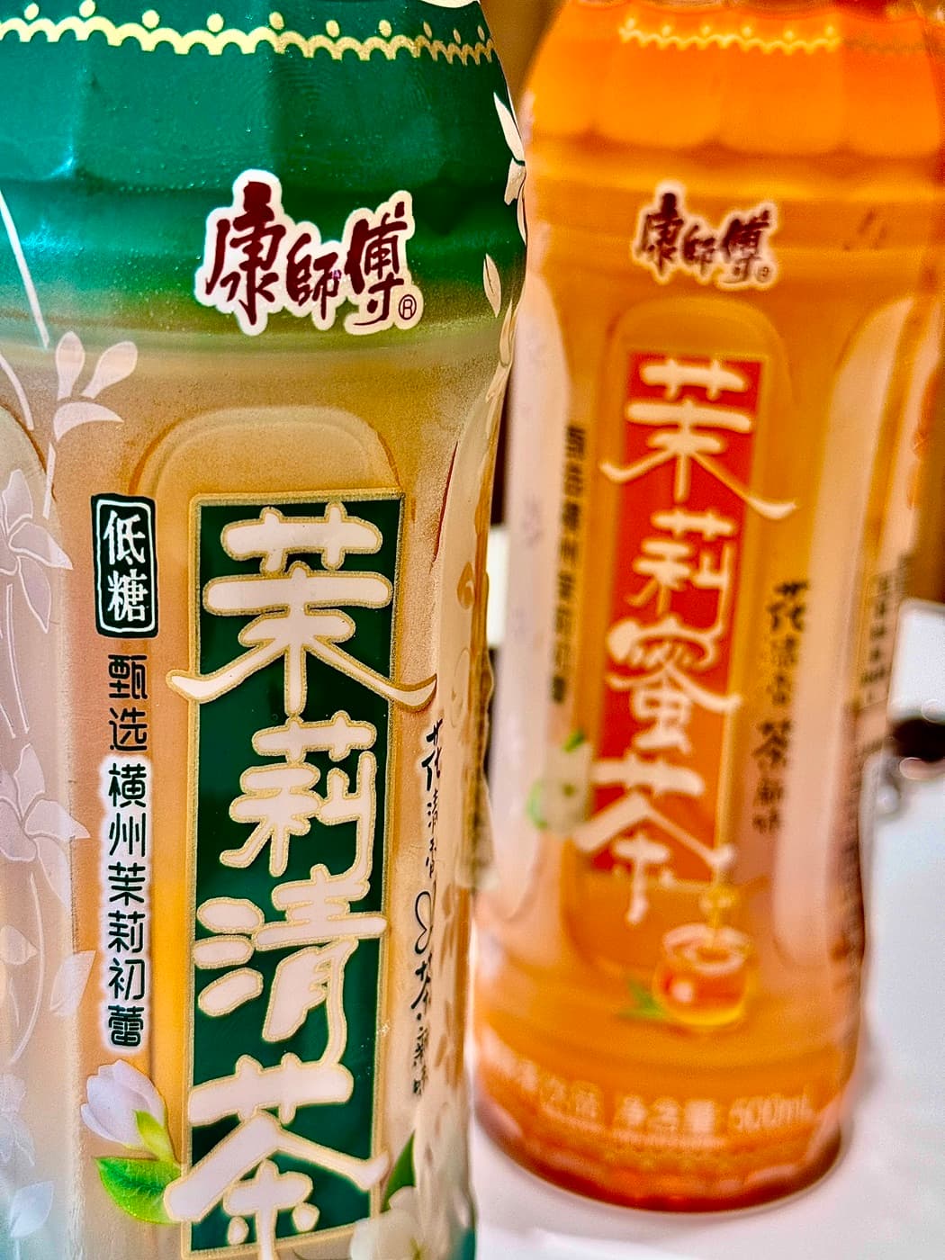 Bottles of jasmine tea and jasmine honey tea on the table at Mr. Wang Hot Pot Oxford