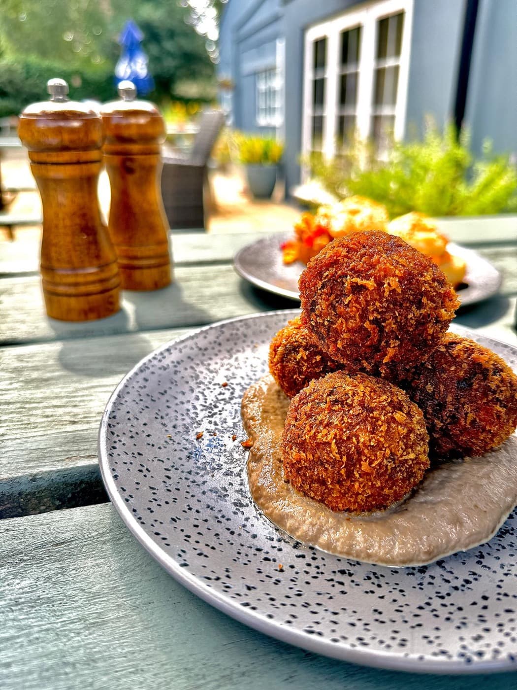 BBQ beef shin arancini at The Prince of Wales Iffley, stacked on a creamy mushroom puree