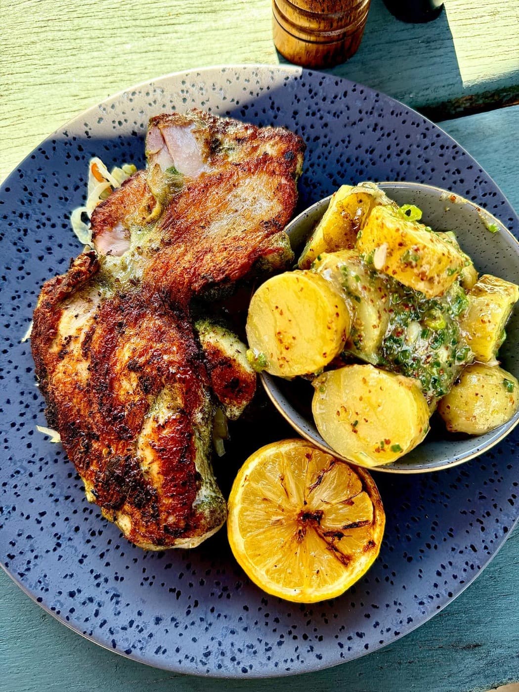 Grilled lemon and marjoram half chicken at The Prince of Wales Iffley with warm potato salad, shredded fennel and a charred lemon